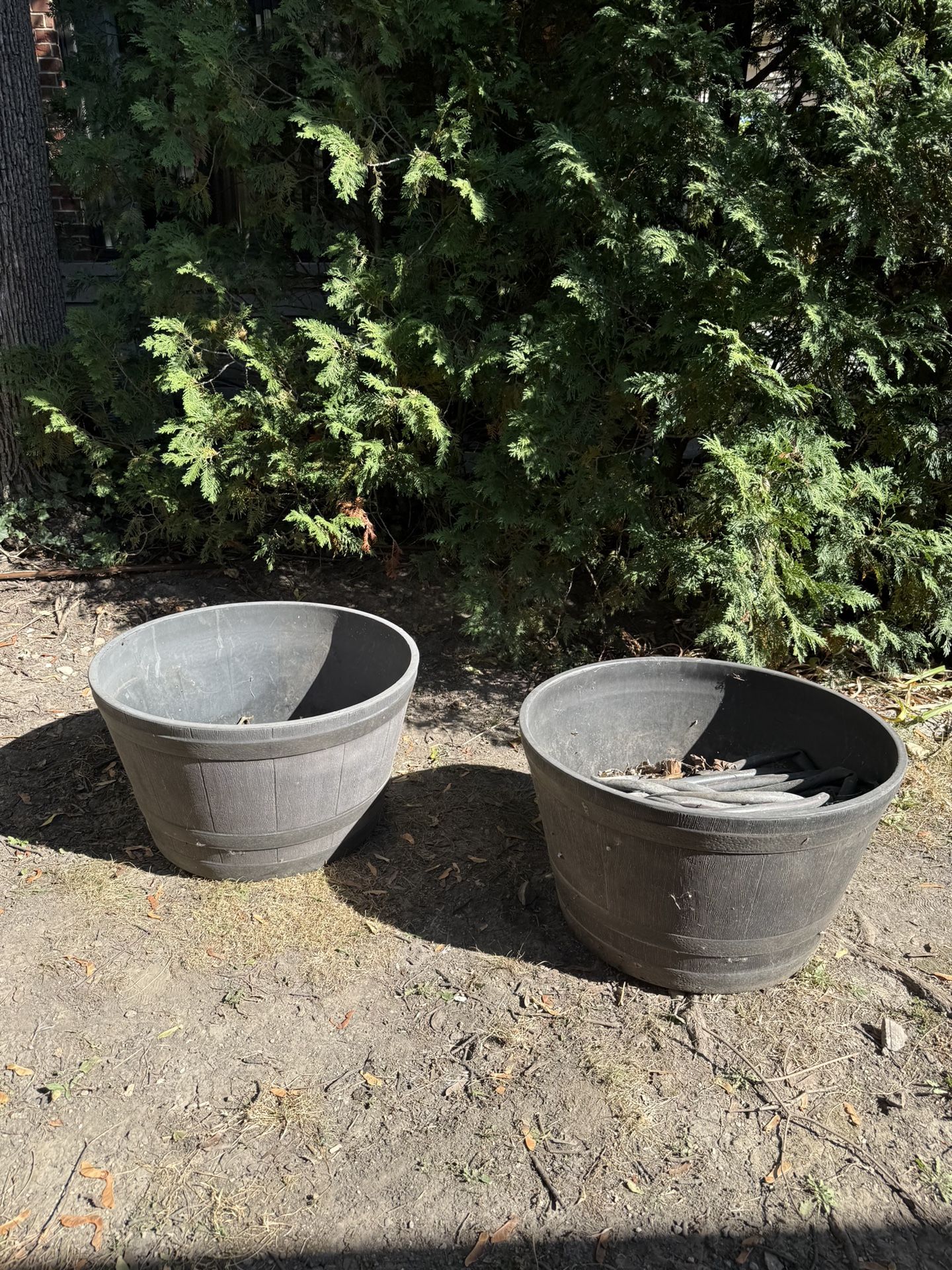Two fall harvest planter buckets