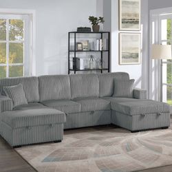 GREY CONVERTIBLE SECTIONAL WITH PULLOUT AND STORAGE