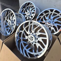 22" TIS rims 22x12 chrome big lip.  $2000