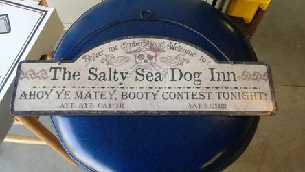 Pirate booty tin sign