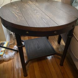 A Pair Of Round Wood End table 