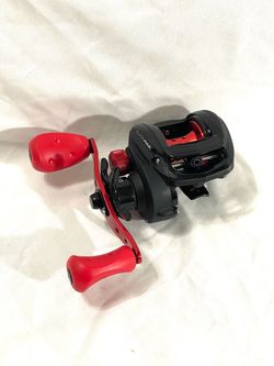Brand new never used medium action, Abu Garcia, black Max bait, caster fishing reel. Right handed.