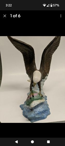 Hand Painted Ceramic Eagle clutching a salmon. 