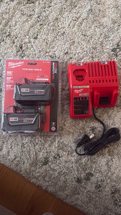 Milwaukee M18 Red Lithium XC5.0 2 pack batteries with charger
