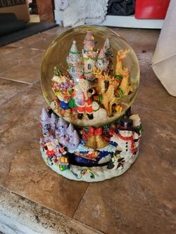 Festive Santa, reindeer, castle, snow globe