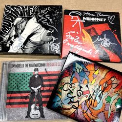 90's Rock CDs +Hand signed CDs(Mudhoney, Meat Puppets and Tom Morello)+ Nirvana's LiveDVDand some Rear CDs part2