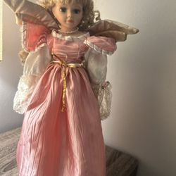 Porcelain Angel Doll 17” With Stand.
