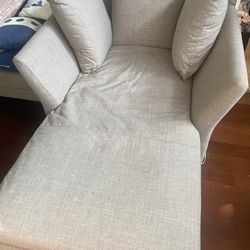 Gray upholstered chaise loung