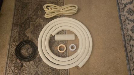 16-foot insulated copper line set with 1/4 inch and 3/8 inch flare connections.