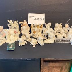 Snow Babies Five Dollars Each Except The One With the gold.