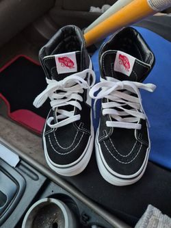 Vans off The Wall shoes.