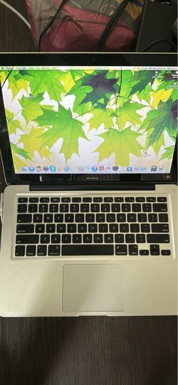 Mac book old edition. Turns on and works.