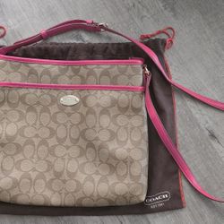 Coach purse with pink strap