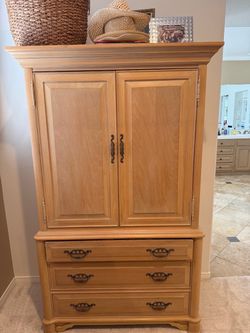 Thomasville - armoire- 2 doors - 3 drawers - electrical outlet.