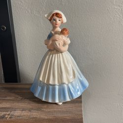 Nurse Figurine Holding Baby 