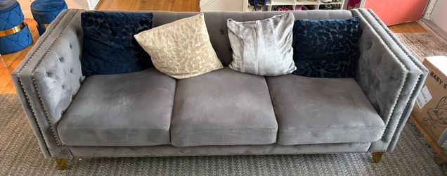 Approx. 78″ Wide Gray Velvet-Style Three-Seater Sofa with Gold-Tone Nailhead Trim + FREE Blue Storage Ottoman