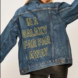 Levi's x Star Wars denim jacket featuring the text "IN A GALAXY FAR FAR AWAY"
size small