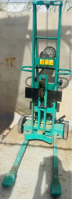 Heavy-duty industrial drum handling lift for lifting, moving, and stacking barrels/drums