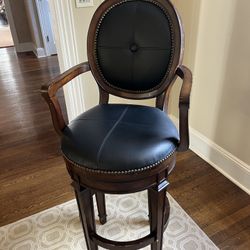 Set of 4 Swivel Hillsdale Bar Stools 1 has a broken arm. Can be fixed 22w x 49h x 29sh Leather and wood Smoke and pet free.