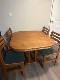 Solid wood dining table and 4 chairs