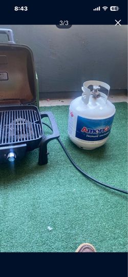 Next grill with propane tank