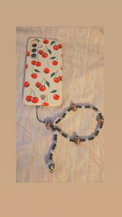 Raiders phone wristlet charm