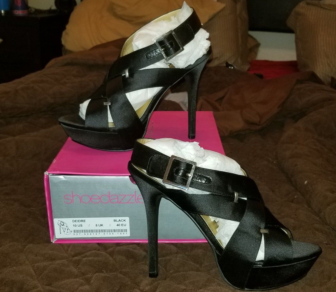 Size 10. Brand new never worn. Box included