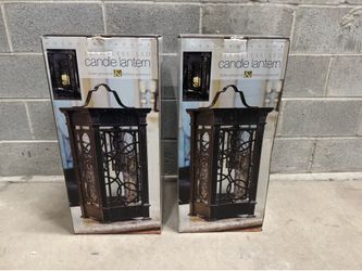 Brand new Indoor/Outdoor Flameless LED Candle Lantern Solar lantern with nickel-metal hydride (NIMH) rechargeable batteries and 3-AAA batteries. Set2