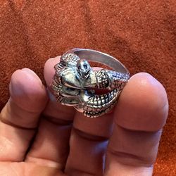 Silver claw ring with small skull