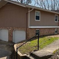 3 Bedroom 2 Bathroom Two Garage Doors Opening 