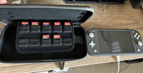 Nintendo Switch Lite W/7 Games