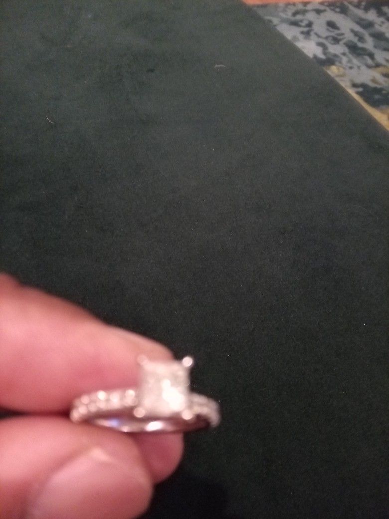 1 carrot and a half butterfly cut diamond engagement ring