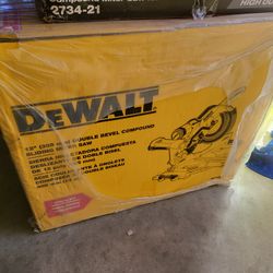 Dewalt brand new 15 Amp Corded 12 in. Double Bevel Sliding Compound Miter Saw, Blade Wrench and Material Clamp