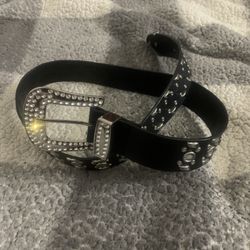 Black faux leather western-style rhinestone and wave stud belt