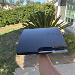 PS3 W/ Batman Series And Controllers
