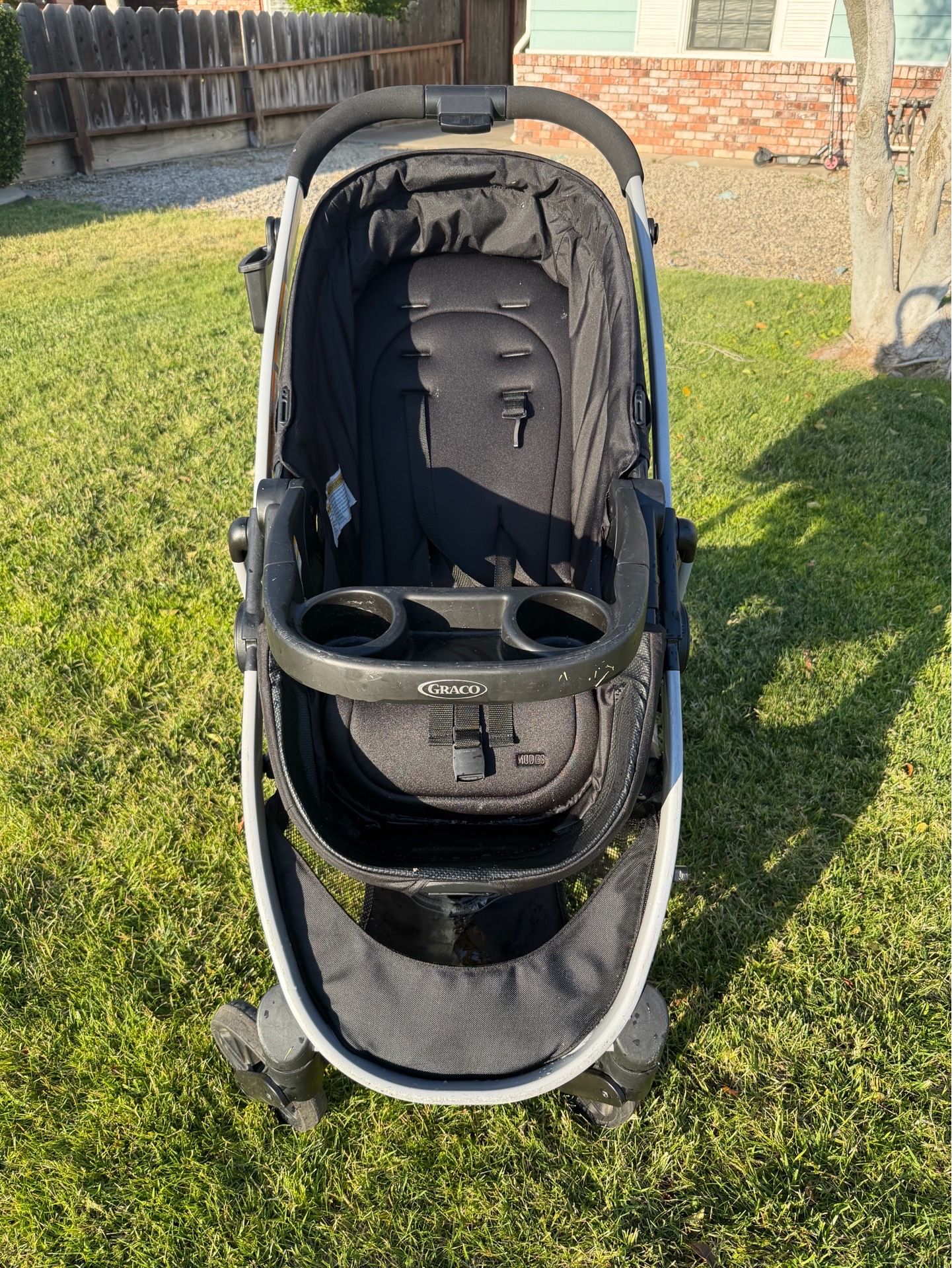 Graco Stroller , Black, Fits in trunk of a coop. Easy to travel with