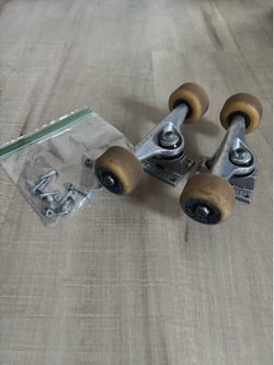 Skateboard trucks