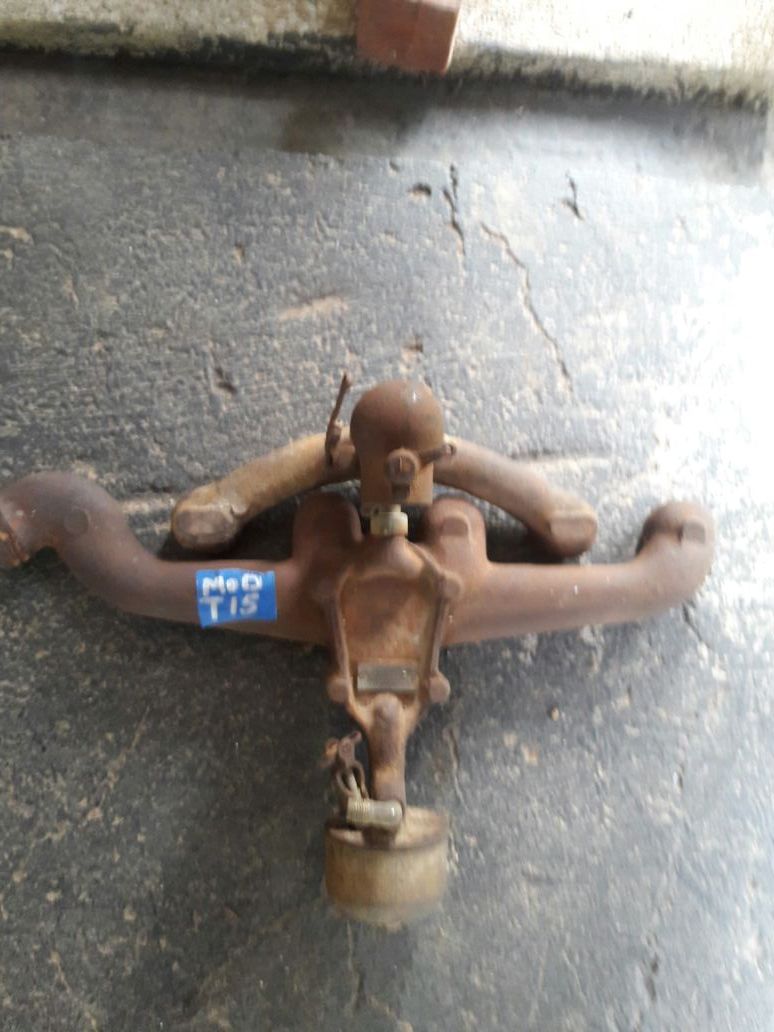 Vintage model t stamped manifold made by holley