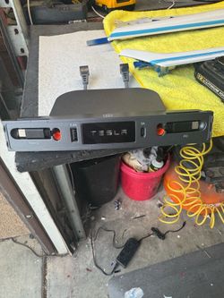 Tesla model y 2nd gen center console charger.