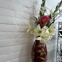Decorative Floral arrangements In Red vase