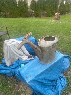Antique watering can