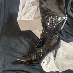 Woman’s thigh high boot