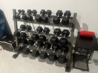 Dumbbell set 5lbs to 50lbs. Good condition with minor scratches and dents.