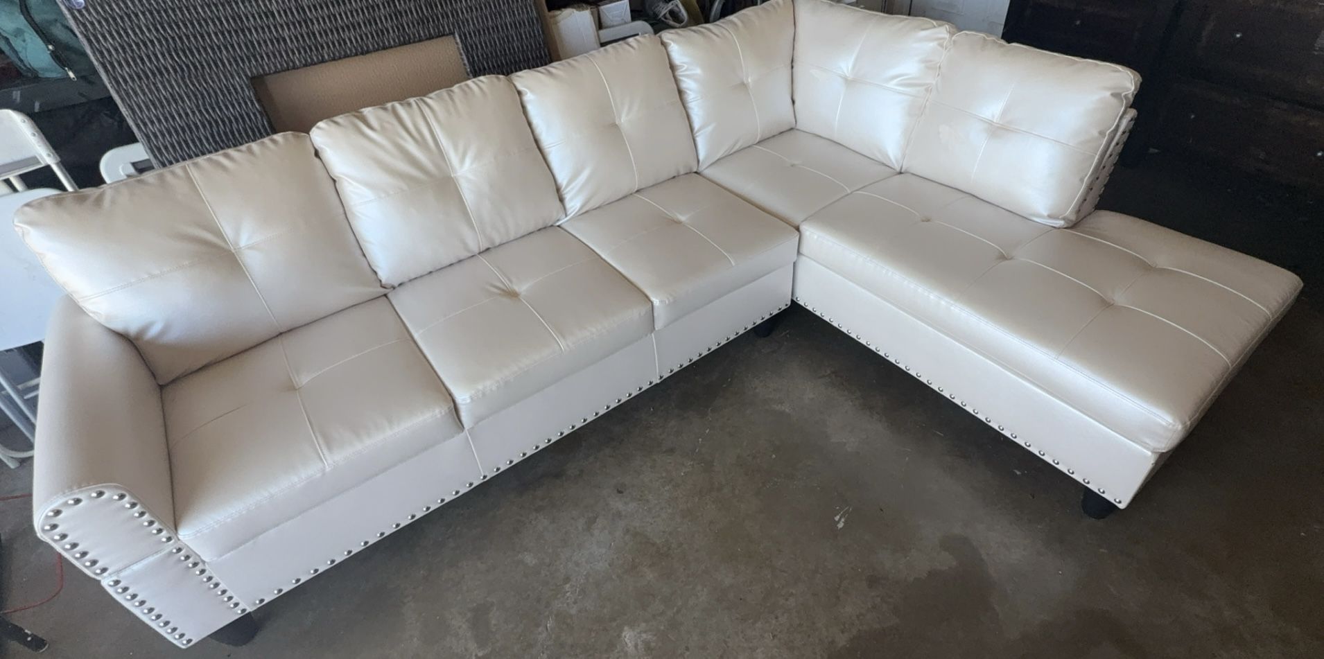 Brand New Off White 2 Piece Faux Leather Sectional with defects
