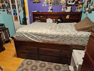 Cherrywood Full size bed with built-in drawers and shelves
