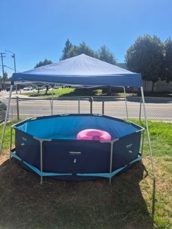 Folding pop-up canopy tent