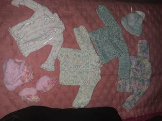 Hand crocheted baby clothes