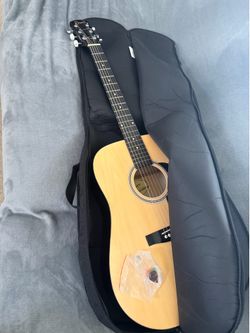Squier by Fender Guitar + Guitar bag and picks