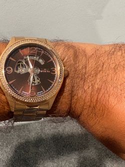 Diamond rose tone Watch $200