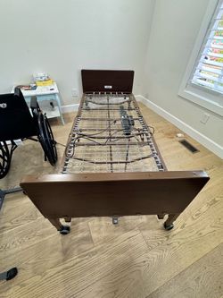 Medical twin electric bed